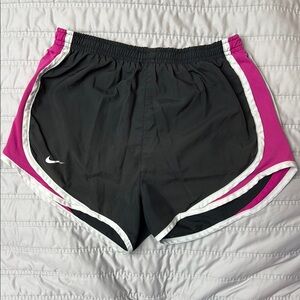 Nike Women’s Black and Pink Dry Fit Athletic Shorts with Dolphin Hem